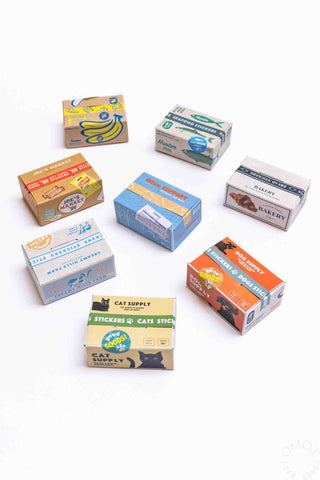 Sticker seal box set showing multiple themed boxes with sticker packs