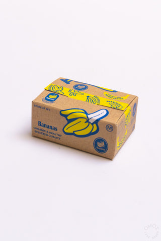 Bananas-themed seal sticker box with large blue banana graphic on the front