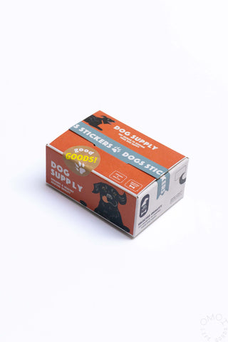 Sticker seal box with orange and black supply design on the lid