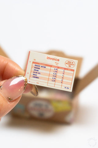 Hako seal sticker box invoice-style sticker shown on a package.