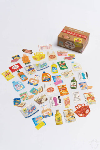 Hako seal sticker box with many small food-themed stickers and the box.