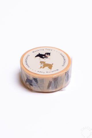 Shiba dog washi tape roll, clear core, beige band with black and tan dogs