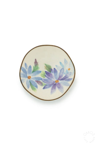 Round mini decorative plate with blue and purple floral design, thin gold rim