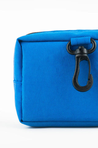 Blue fabric tofu pouch with zipper and round keyring hook