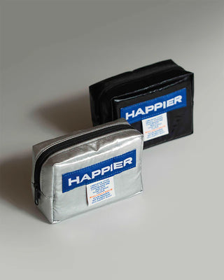 Black and silver tofu pouches with zipper and Happier label