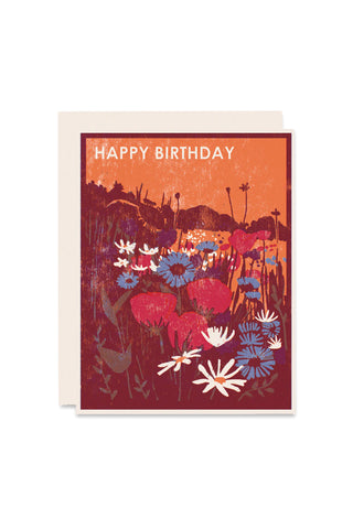 Wildflowers letterpress birthday card with orange floral landscape and “Happy Birthday” text