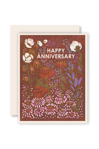 Happy Anniversary letterpress card with white floral artwork and “HAPPY ANNIVERSARY” text