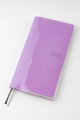 Purple planner cover with “2024” marking and clear protective sleeve