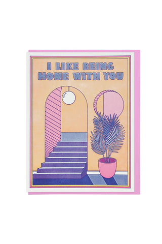 Greeting card with stairs, window, potted plant illustration and 'I LIKE BEING HOME WITH YOU'
