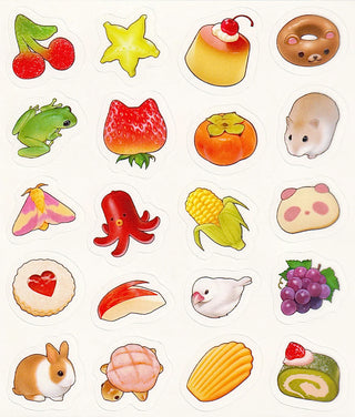 Clear sticker set close-up featuring fruit, sweets, animals, hearts, and star shapes