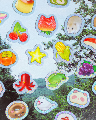 Close-up glitter stickers with cherries, star, crab, frog, and food icons