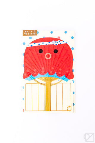Uchiwa-style greeting card with red fan illustration and blue polka dots