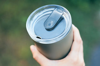 KINTO TO GO tumbler lid with plug and open drink opening