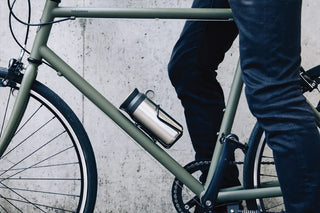 500ml travel tumbler clipped to a bicycle frame