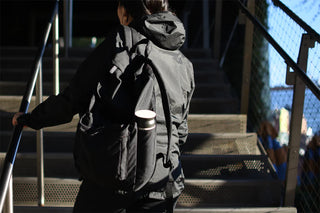 500ml travel tumbler tucked in a backpack pocket