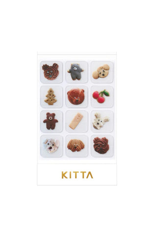 Cookie-themed washi tape set in a KITTA sleeve, featuring small cookie character designs