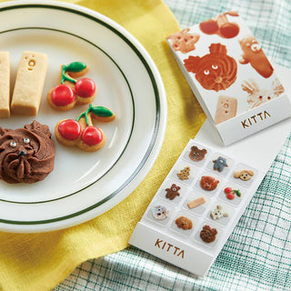 Cookie character washi tape set by KITTA, with multiple tape strips in a display sheet