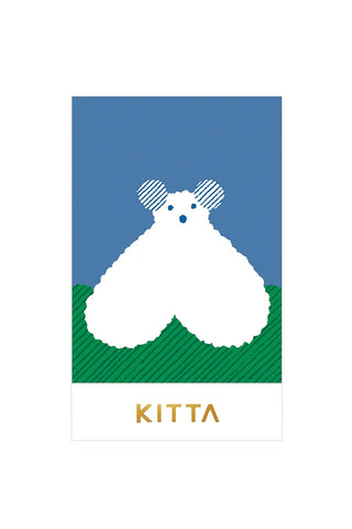 Washi tape card with two white bear shapes over blue sky and green ground