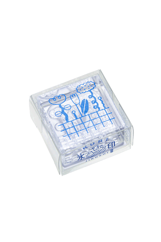 Clear stamp set in clear box with blue flower garden line art