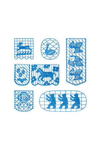 Blue clear stamp set pieces with multiple flag-themed patterns for crafting