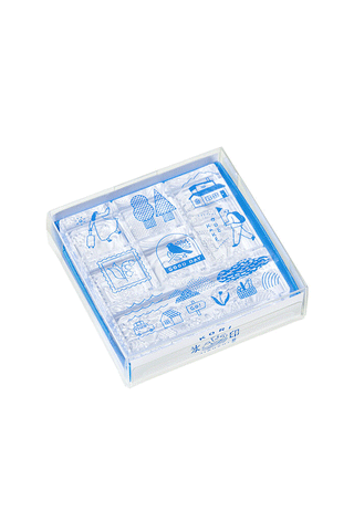 Clear stamp set in a plastic case with blue trip-themed icons