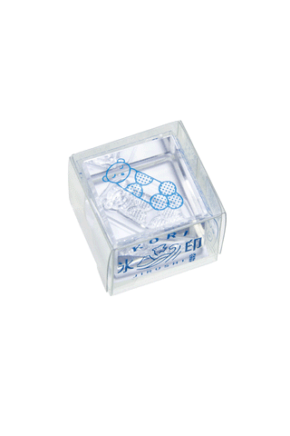 KORI JIRUSHI clear stamp with small blue otter figure on transparent block