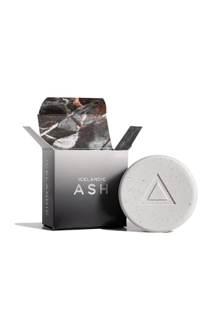 Kala Hallo Sapa volcanic ash soap bar with gray speckled round shape and triangle logo