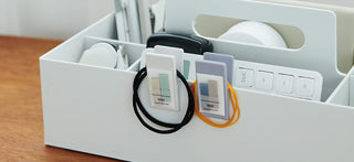 Mini clip sticky notes in pastel colors with a note holder tray