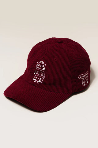 Burgundy corduroy baseball cap with front embroidered logo and side patch