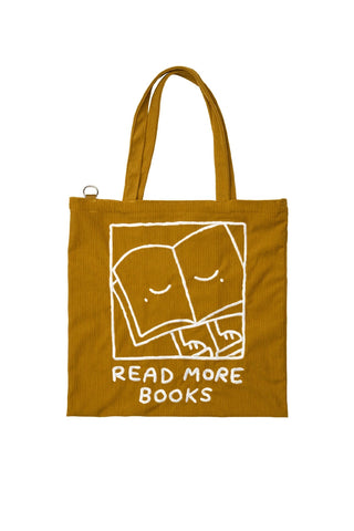 Mustard canvas tote bag with Read More Books print, front view.