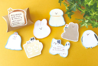 Set of fluffy cat-shaped sticky notes in white and gray with cute faces