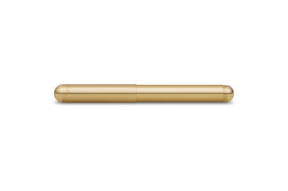 Brass fountain pen, side view with capped end and barrel grooves