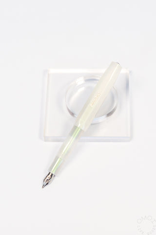 Light green fountain pen with medium nib, shown in clear presentation box