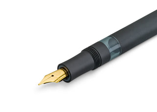 Close-up of Kaweco fountain pen nib with gold medium tip and black feed