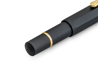 Black Kaweco fountain pen with gold trim band and back end cap