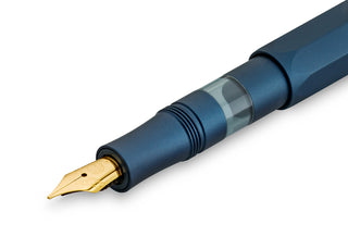 Gold nib close-up on navy Kaweco fountain pen
