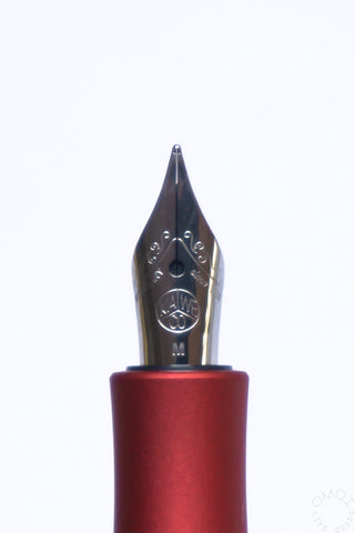 Kaweco AC Sport fountain pen nib close-up on red barrel