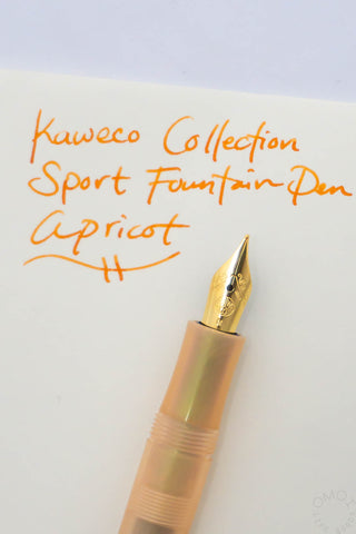 Apricot Kaweco Collection Sport fountain pen with gold nib, close-up view