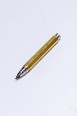 Raw brass clutch pencil with knurled grip and metal lead tip