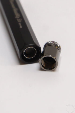 Clutch pencil end caps and lead tip with metal clutch mechanism