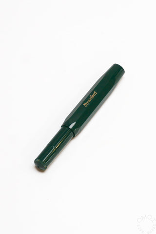 Green Kaweco Sport rollerball pen with gold clip and capped end branding