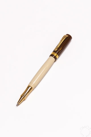 Brown and cream student rollerball pen with gold trim and pointed nib
