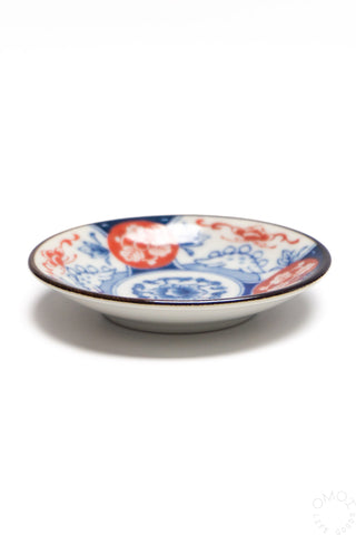 Mini round plate with blue-and-red floral motif, shallow bowl shape