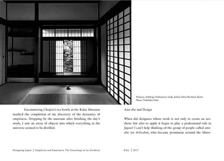 Open book spread with museum photo across the pages and small caption text