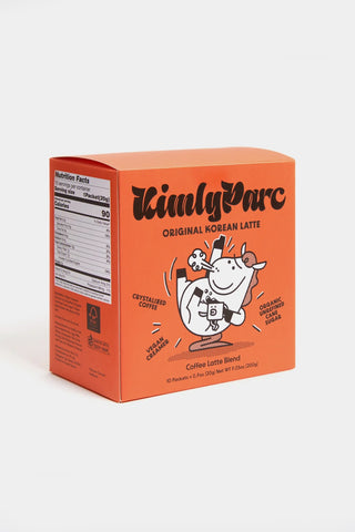 Orange instant latte mix carton with cartoon character on the front label