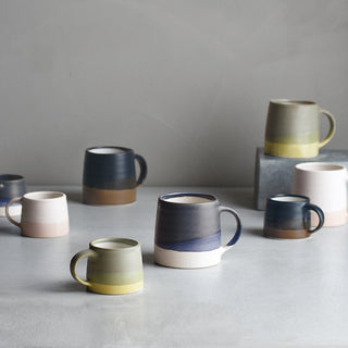 Ceramic coffee mugs set in navy/white and other colors, curved handles