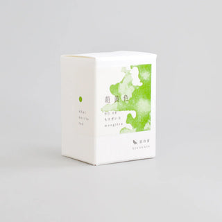 Moegiiro ink presentation box with green watercolor artwork on the front.