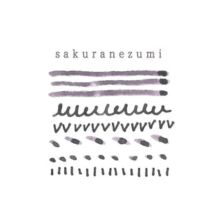 Purple ink color swatches and writing strokes on white
