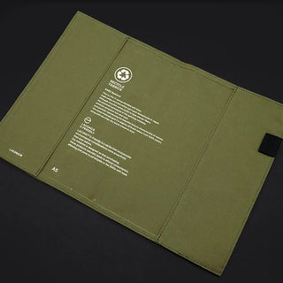 Olive A5 notebook cover interior with recycling icon, A5 marking, and printed text