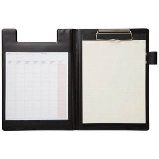 A5 field pad in black, open with graph paper sheet on clipboard